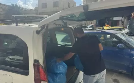 تنمية طولكرم تسلم عمال غزة في مدينة طولكرم مواد غذائية